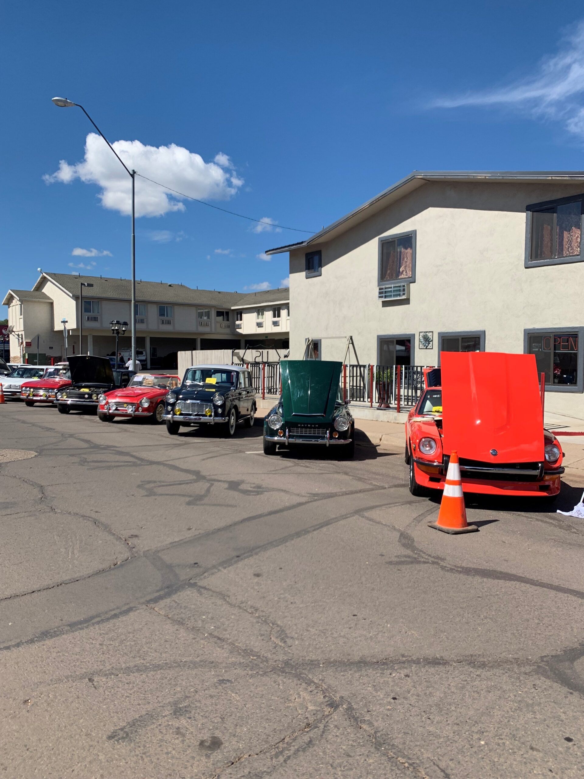 a row of classic cars